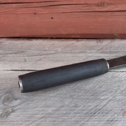 Hirsitaltta, Kouru -Uittokaluston Myyntiliike taltan kahva 1